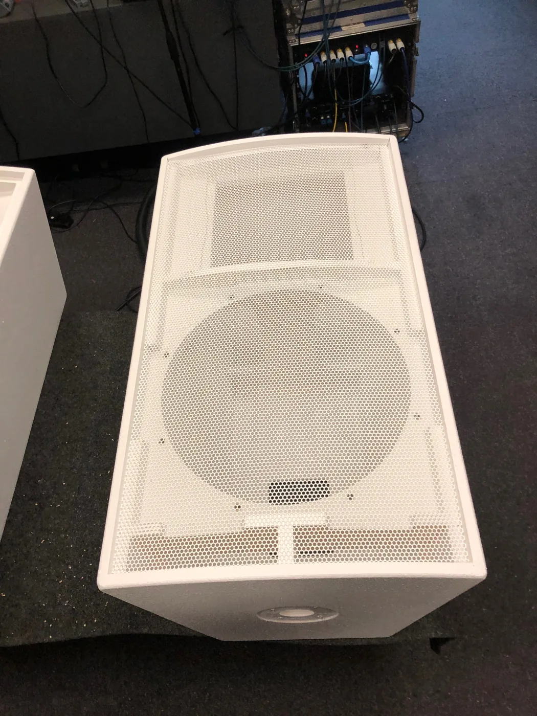 White MT1514 front grille during assembly