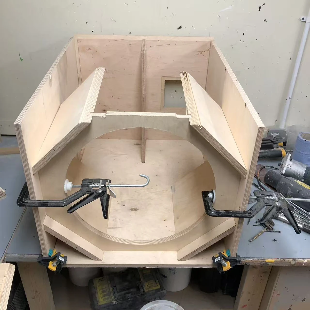 S118 front baffle clamped during assembly