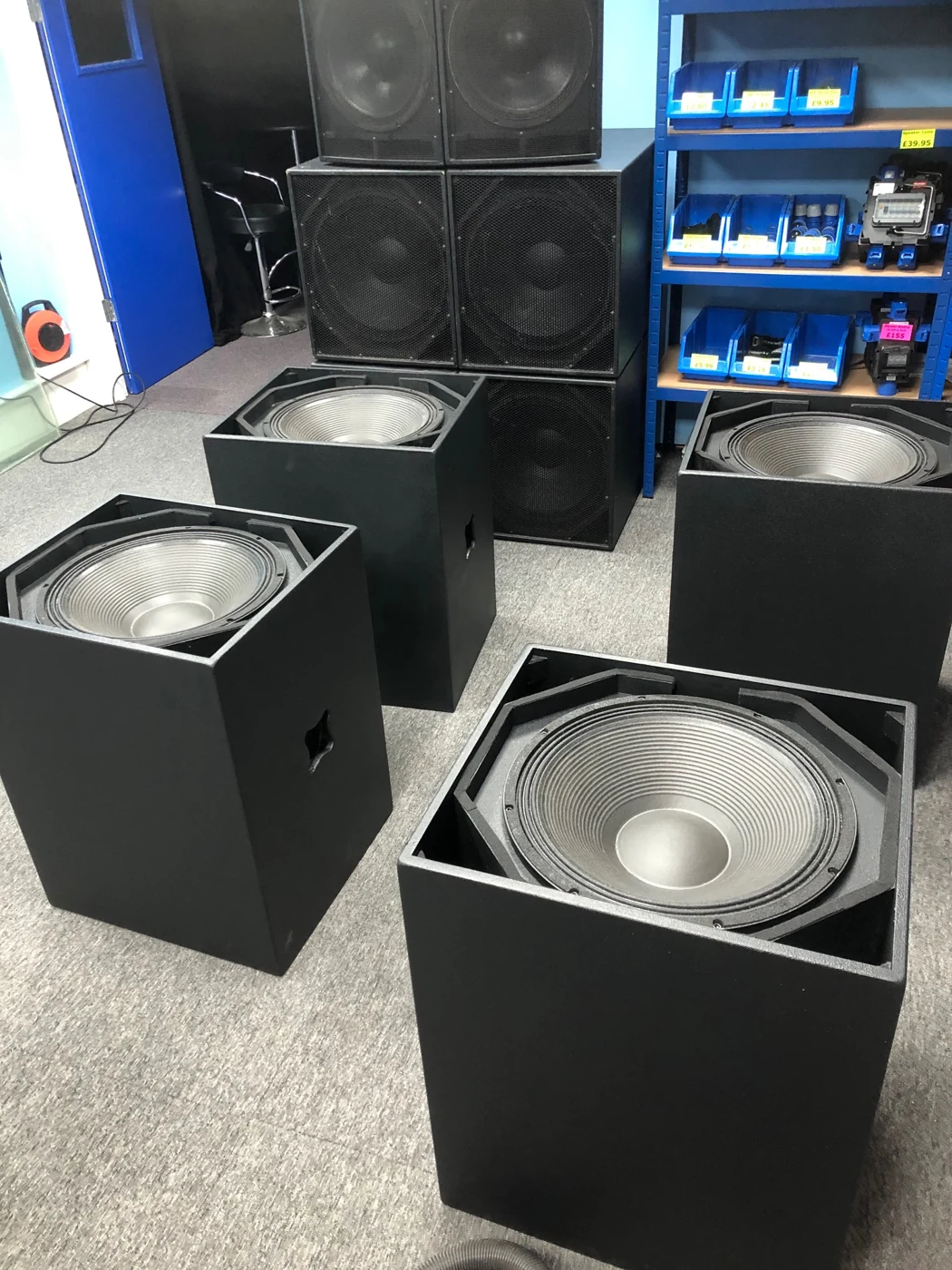 S118 cabinets during driver fitting and grille preparation