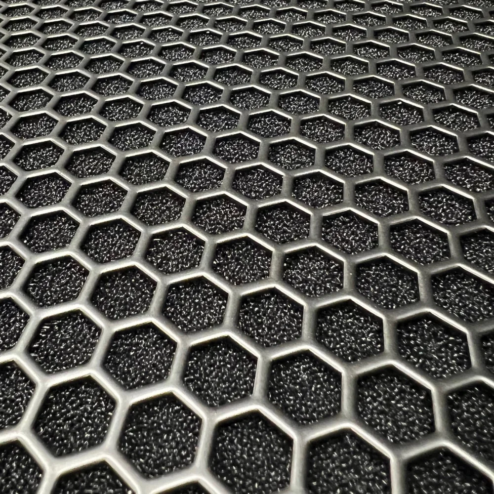 Close-up of the SB118 front grille and foam backing