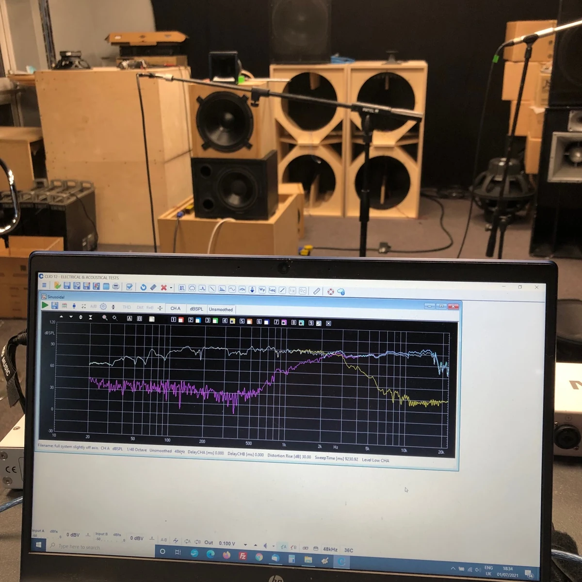 JAM Systems test room with measurement equipment and prototype SB218 cabinet in the background